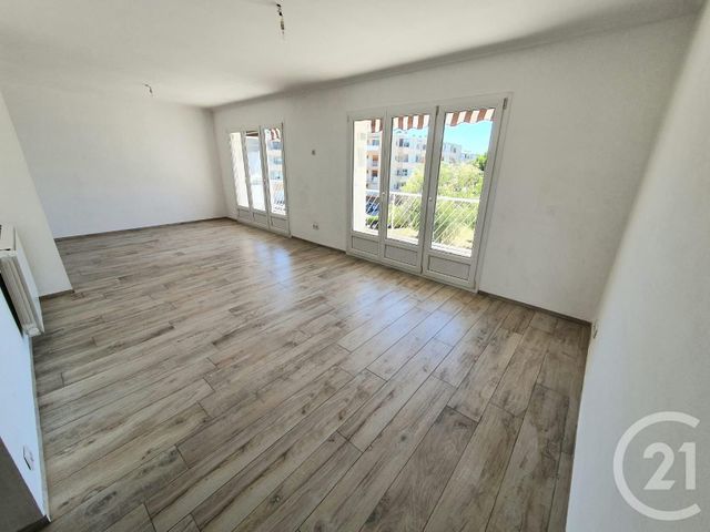 Afficher la photo en grand appartement à vendre - 4 pièces - 72.0 m2 - LE PRADET - 83 - PROVENCE-ALPES-COTE-D-AZUR - Century 21 Sagittaire Immobilier